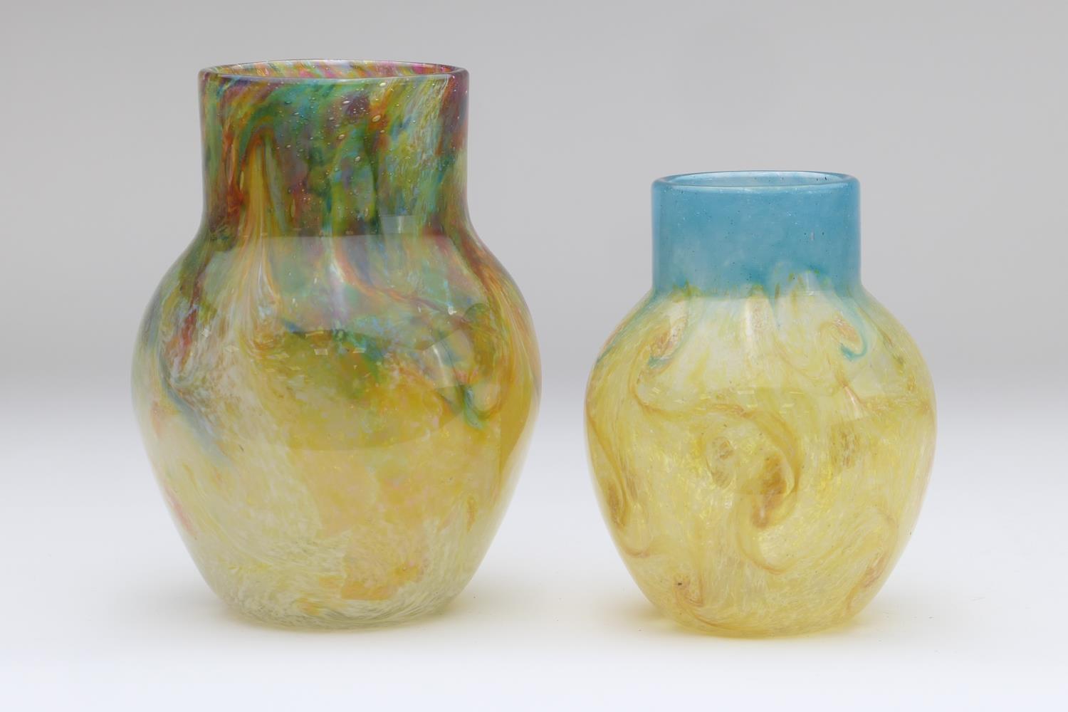 Two Monart glass vases, circa 1930, each of baluster form decorated with swirls of coloured glass,