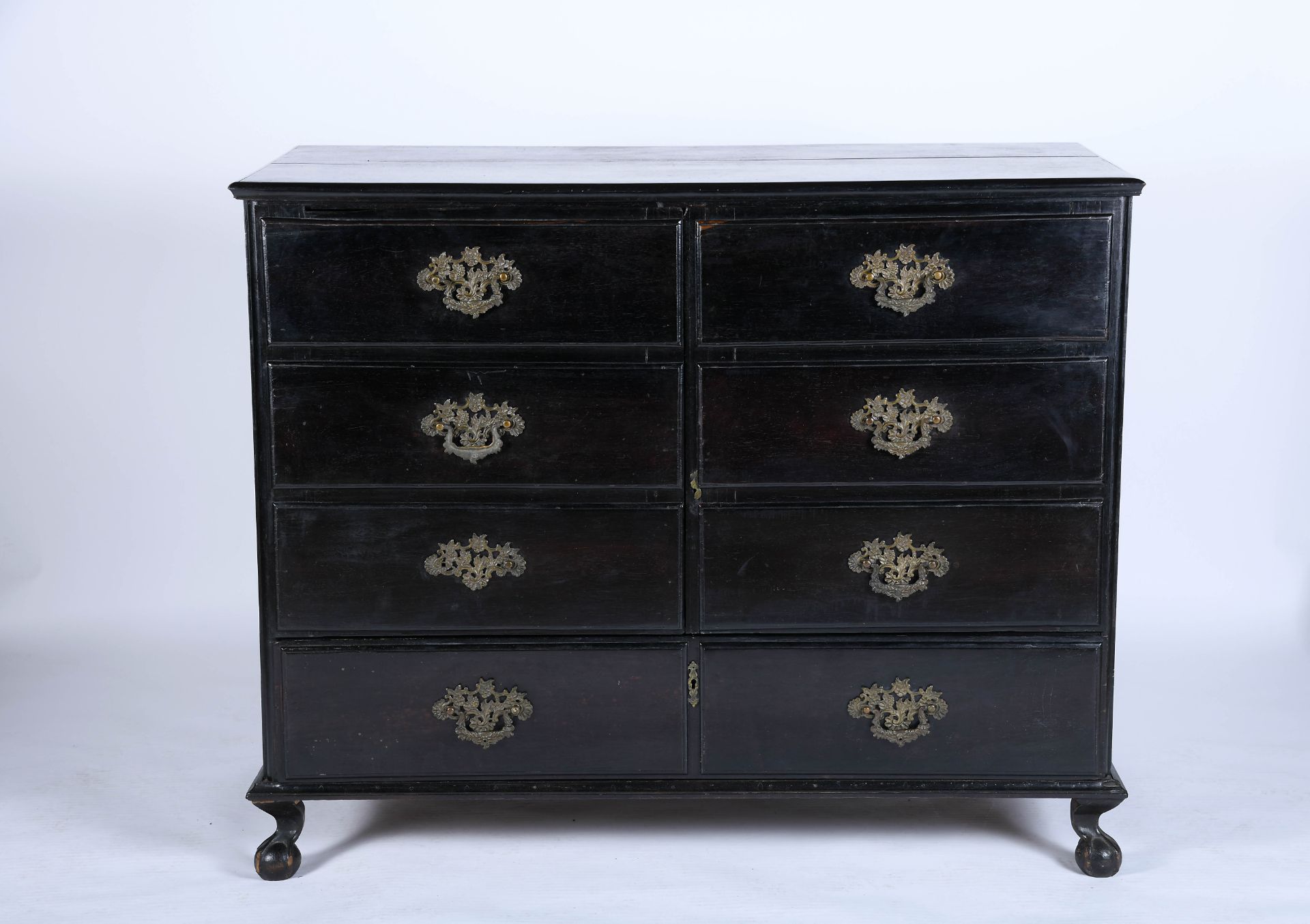 A large chest with drawer and two doors, simulating eight drawers