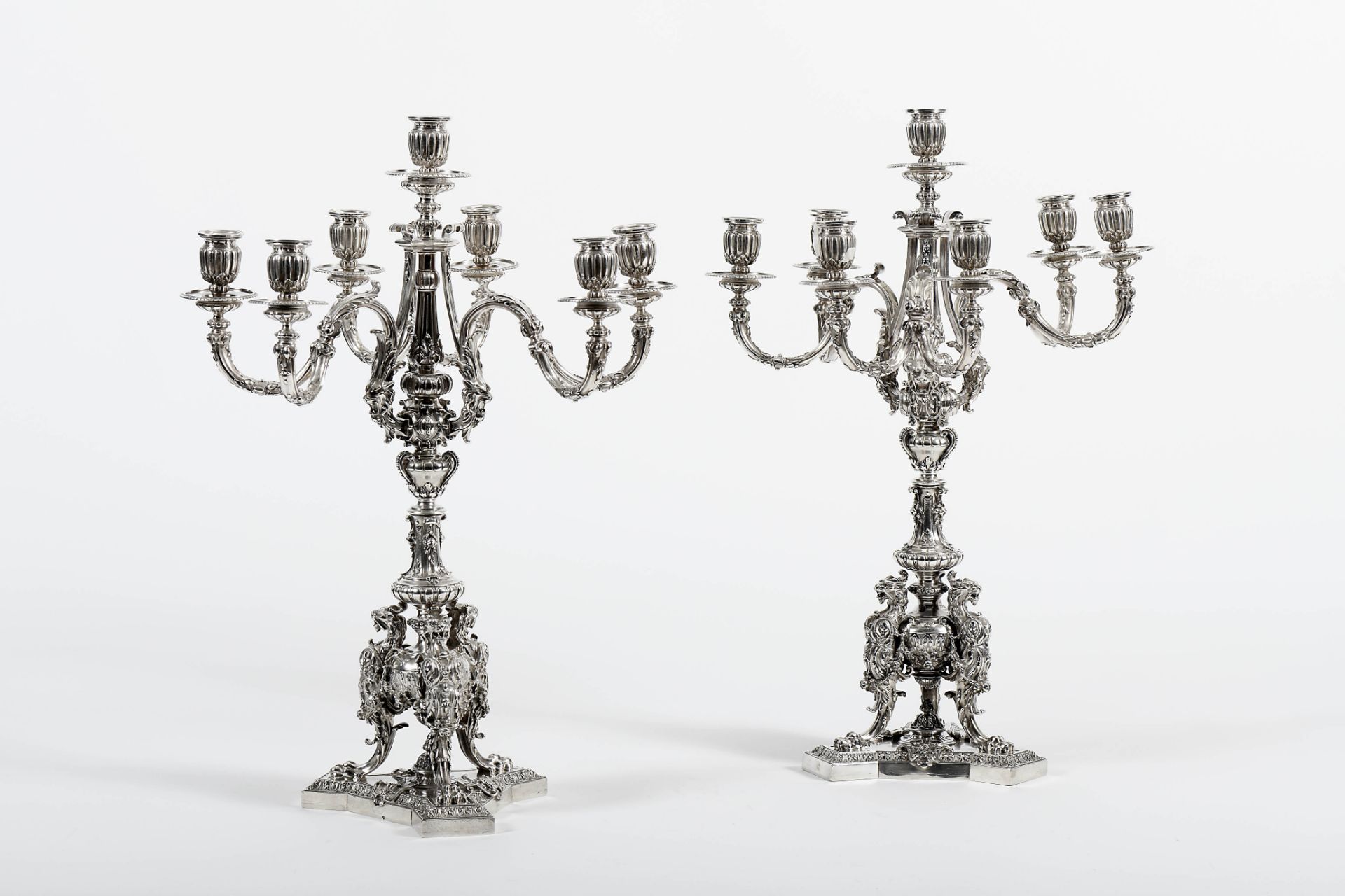 A pair of A three-armed candelabra with seven-light each