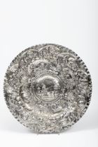 A large scalloped ceremonial salver with wavy edges