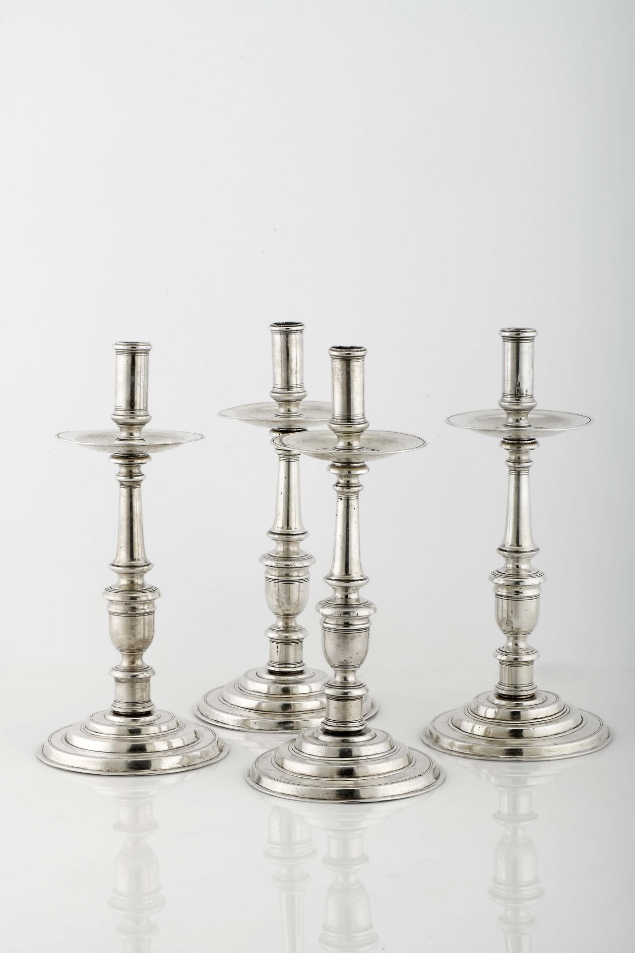 A set of four torchères