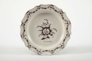 A large scalloped plate