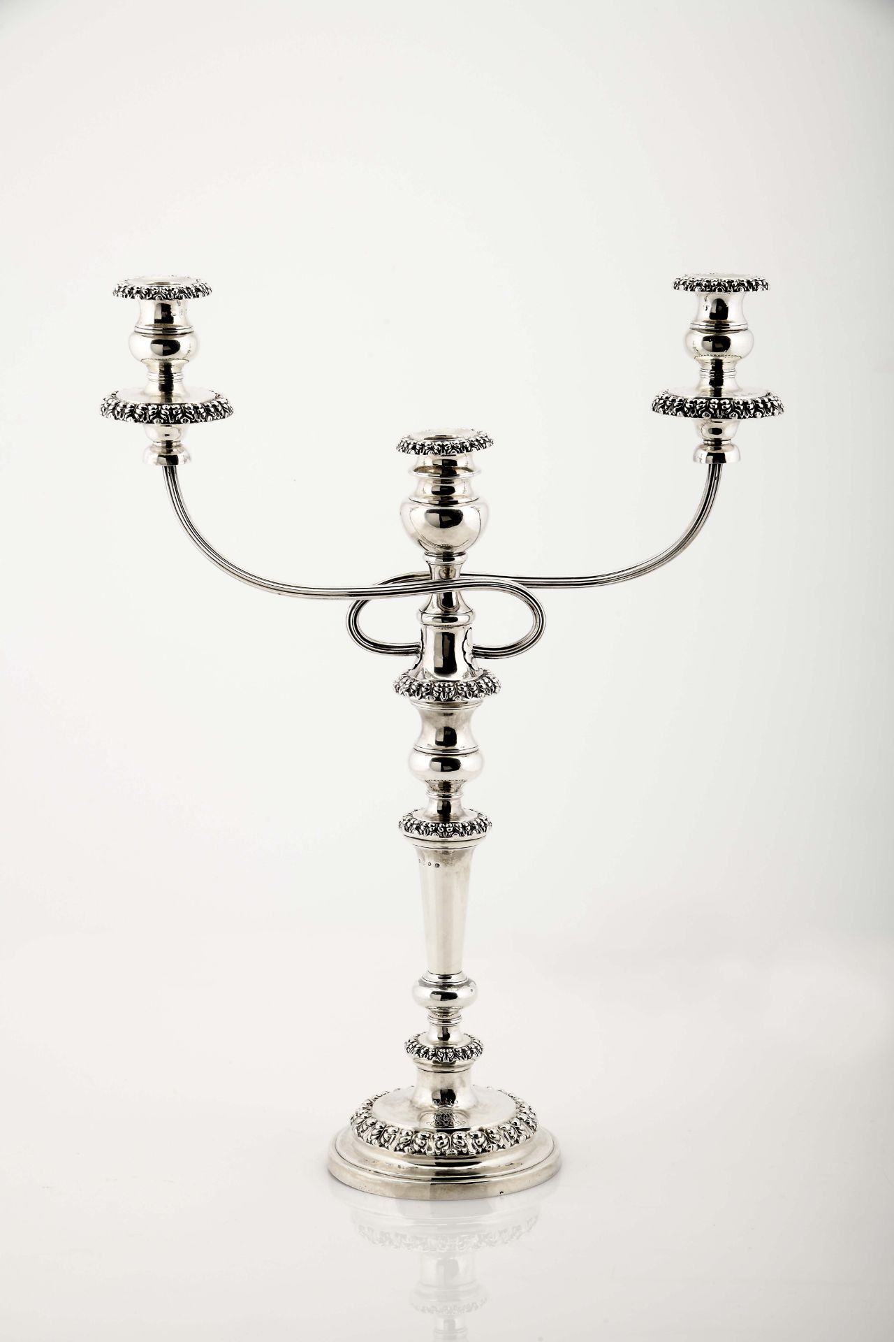 A large candlestick with a three-light serpentine