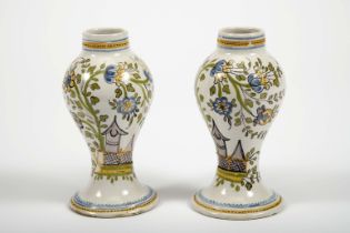 A pair of potted vases