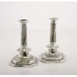 Pair of candlesticks with octogonal base
