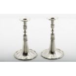 A pair of skirt candlesticks