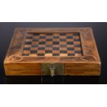 A Hinged Chess, Backgammon and Nine Men’s Morris boards (Mill game) closing in the shape of a box