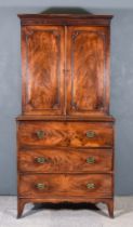 A George III Mahogany Secretaire Bookcase, the upper part with dentil moulded cornice, four