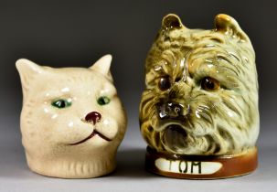 A French Pottery Novelty Terrier Head "Tom" Money Box, Early 20th Century, with transfer mark for