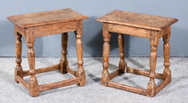 A Pair of Old Oak Joint Stools of "17th Century" Design, each with moulded edges to top, plain