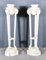 A Pair of Cream Painted Circular Jardiniere Stands, with moulded and bead mounts, on square