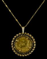 An Eastern Gold Coin Set in 18ct Gold Brooch or pendant at will mount, 35mm in diameter, gross