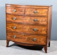 A George III Mahogany Bow Front Chest with cross banded top and triple reeded edge, fitted two short