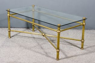 A Modern Plate Glass and Brass Rectangular Coffee Table, on turned supports and X-pattern stretcher,