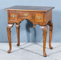 An Early 20th Century Figured Walnut Lowboy of "George II" Design, with cross banding, moulded