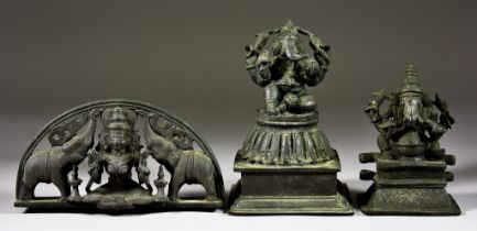 An Indian Bronze Seated Figure of Ganesh, 19th/20th Century, on stepped base, 6.25ins (15.9cm) high,