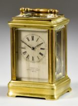 A Late 19th Century Miniature Brass Carriage Clock, retailed by Thornhill, 144 New Bond Street,