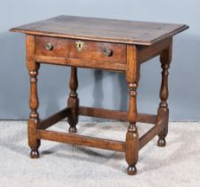 A Late 17th Century Oak Side Table, with three plank and moulded edge to top, fitted one frieze