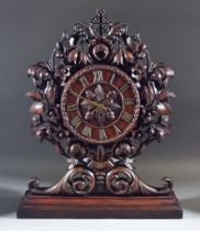 A 19th Century Hardwood Cased Mantel Clock, the 10.5ins dial with bead mounts, Roman numerals, the