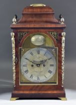 A George III Mahogany Bracket Clock, the 7.75ins arched brass dial with silvered chapter ring with