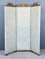 An Early 20th Century Three Fold Draught Screen, each fold with gilt double scroll and leaf