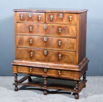 A 18th Century Walnut and Inlaid Chest on Stand, with moulded and cross banded edge to top, fitted