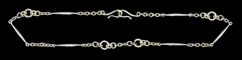 A Silver Coloured Metal Fine Bracelet, 180mm in length, gross weight 3.7g Note: Metal unmarked but