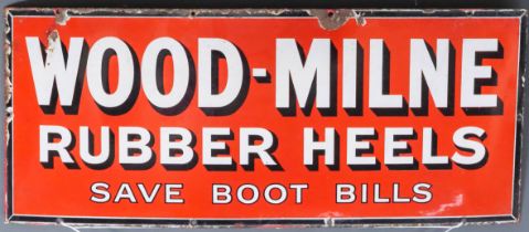 A "Wood-Milne Rubber Heels" Enamel Advertising Sign, Early 20th Century, in red, white and black,