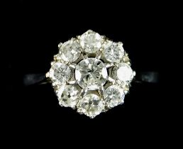 A Platinum Diamond Flower Head Ring, set with brilliant cut white diamonds, approximately 1.3ct,