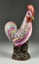 A Chinese Famille Rose Porcelain Figure of a Standing Cockerel, 20th Century, 14ins (35.5cm) high