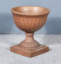 An English Brown Salt-Glazed Stoneware Garden Urn, with fluted body, on square base, 15.75ins high