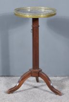 A 19th Century French Mahogany and Gilt Metal Mounted Tripod Occasional Table, the top with