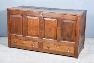 An 18th Century Panelled Oak Mule Chest, with four panels to front, two drawers to base, 56ins