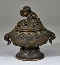 A Chinese Two-Handled Bronze Censer and Cover, 20th Century, the body moulded with birds in flight