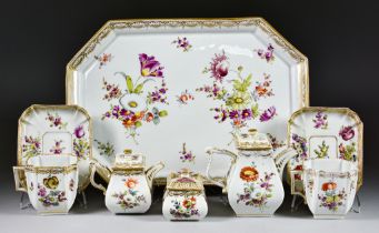 A 'Dresden' Porcelain Cabaret Set, Late 19th/Early 20th Century, of panelled form, enamelled in