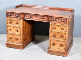 An Early Victorian Mahogany TrayTop Pedestal Dressing Table, with moulded edge to top, fitted