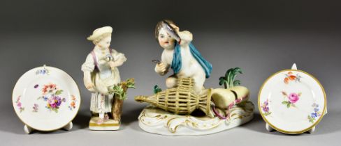 A Meissen Porcelain Figure  of a Putto Crouching Over a Fish Trap, holding fish in either hand,