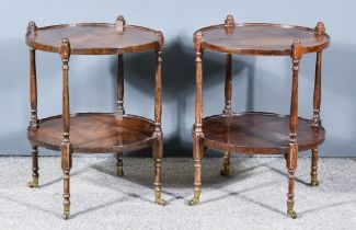 A Pair of 20th Century Mahogany Circular Two Tier Occasional Tables, on slender turned legs and
