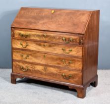 A George III Mahogany Bureau, the plain folding slope enclosing a fitted interior of pigeon holes