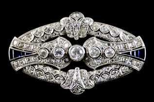 A Diamond and Sapphire Brooch, Early 20th Century, collet set centre stone, approximately .75ct,