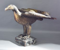 A Continental Desk Lectern, 18th/19th Century, carved as an eagle with outstretched wings, on square