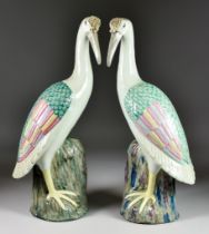 A Pair of Chinese Famille Verte Porcelain Figures of Cranes, 20th Century, 16.5ins (41.91cm) high