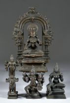 An Indian Bronze Deity, 19th Century, possibly Parvati, the seated god holding attributes before