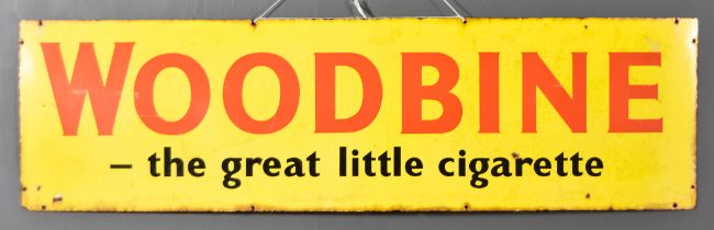 A 'Woodbine Cigarettes' Enamel Sign, Late 19th/Early 20th Century, in yellow, orange and black,