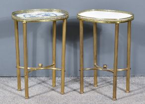 A Pair of Late 19th Century French Gilt Metal Mounted Oval Side Tables, both with pierced brass