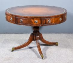 An Edwardian Mahogany Circular Drum Table of George III Design, with brown leather and gilt tooled