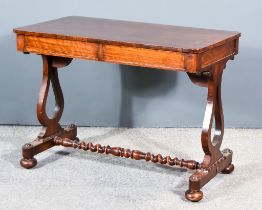 An Early Victorian Mahogany Library Table, with cross banding to top, fitted two frieze drawers,