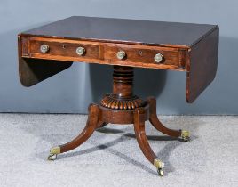 A George IV Mahogany Sofa Table, fitted two real and two dummy frieze drawers, turned central column