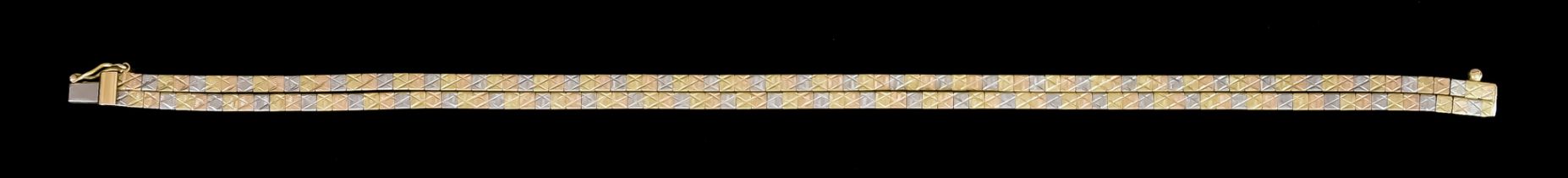 An 18ct Three Coloured Gold Twin Loop Bracelet, 180mm overall, gross weight 13.6g