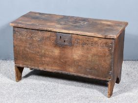 A Late 17th Century Oak Coffer, of small proportions, with square edge to top, the frieze carved